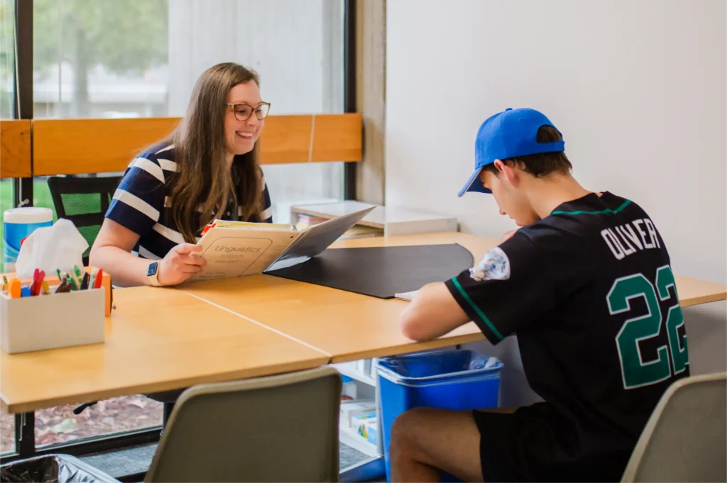 Counselor working with student